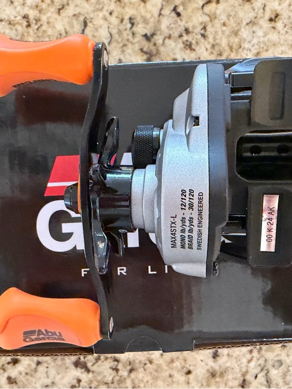 Abu Garcia MAX STX Silver and Orange Left Bait caster fishing Reel - Picture 4 of 6
